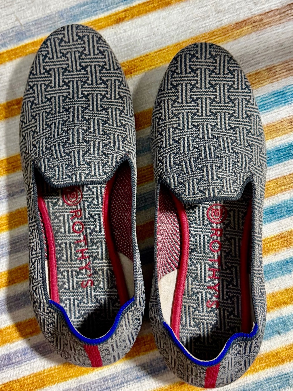 Rothy's Gray Patterned Flats with Red and Blue Accents